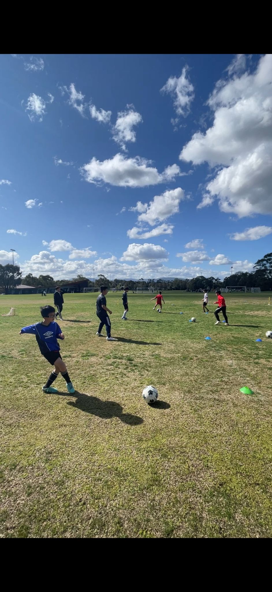 Elevate Football Academy player practicing passing on the field
