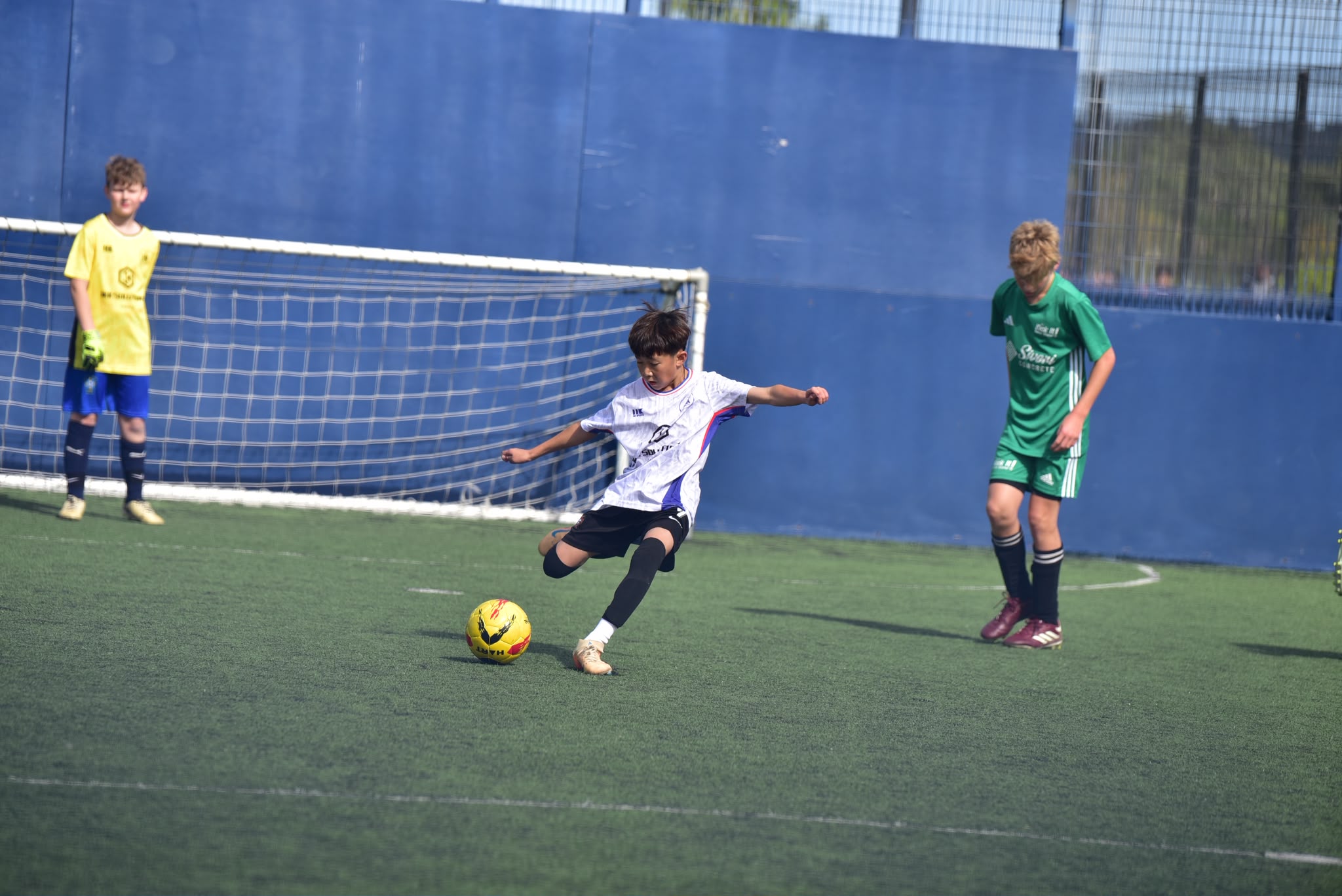 EFA player striking at goal during a match